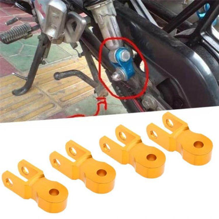 Shock Absorber Extender For Motorcycle, 5 cm Height Increase - gold alloy rear ride height extender shown installed on motorcycle