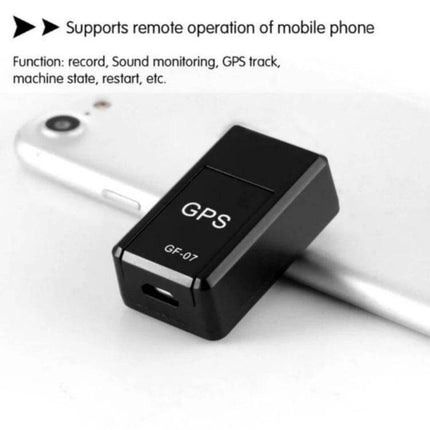 Portable GF07 GPS Tracker for Anti-Lost Monitoring with Magnetic Attachment compact black GF07 GPS tracker placed on smartphone for keys, wallets, pets tracking