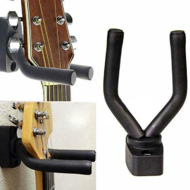 Practical Wall Hanger for Storing Guitars at Home mounted black foam U-shaped guitar wall hanger holding acoustic guitar headstock