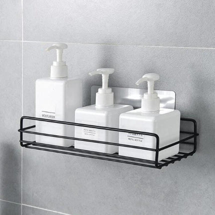 Wall Mounted Wrought Iron Shelf for Bathroom Storage at Home holding three pump bottles on tiled wall, black wrought iron organizer