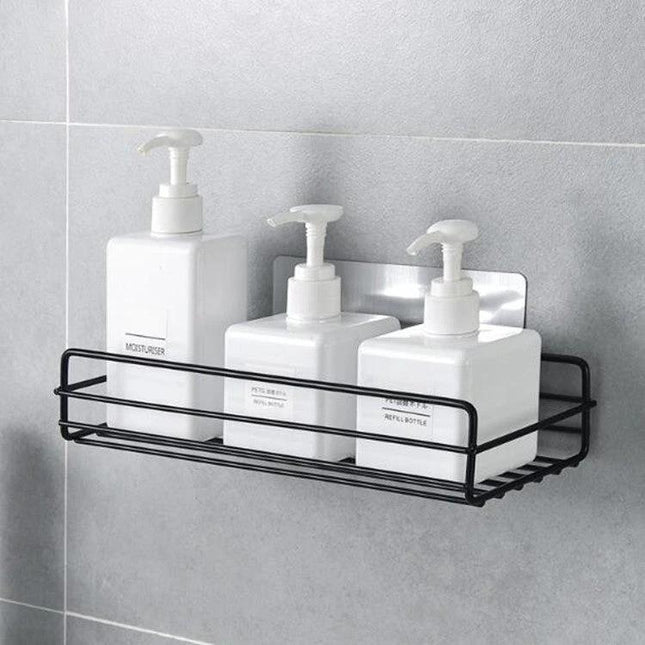 Wall Mounted Wrought Iron Shelf for Bathroom Storage at Home holding three pump bottles on tiled wall, black wrought iron organizer
