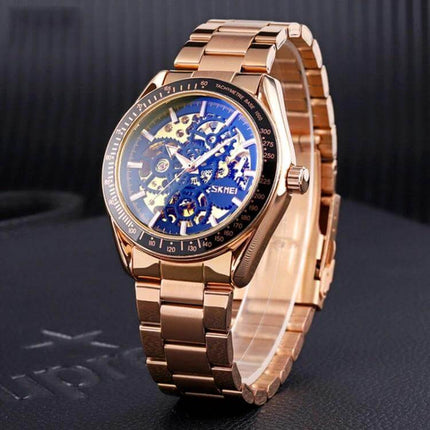 SKMEI Men's Automatic Skeleton Mechanical Watch with Steel Band showing rose gold steel band and transparent skeleton dial