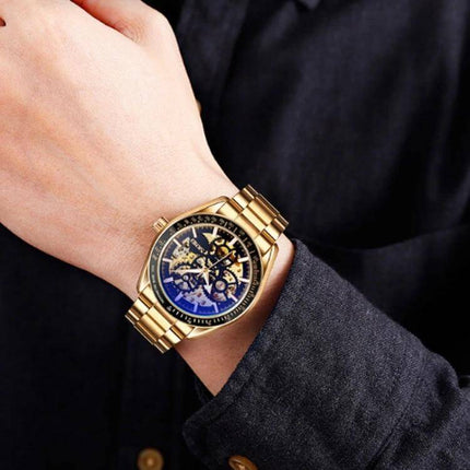 SKMEI Men's Automatic Skeleton Mechanical Watch with Steel Band gold steel band wrist shot showing transparent skeleton dial and automatic movement