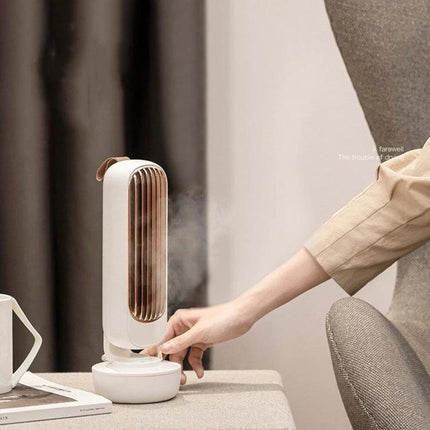 Retro Style Desktop Fan with Humidification and Cooling on desk releasing mist, compact USB-powered retro-inspired design