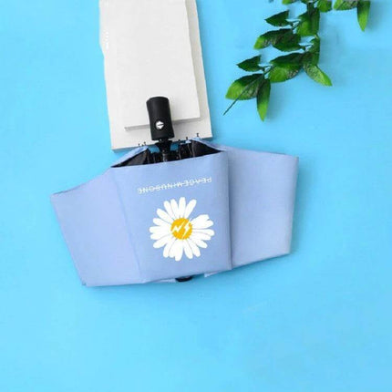 GD Daisy Folding Umbrella for Sun and Rain Protection in compact blue with daisy print, iron frame and impact cloth for commuters and travelers