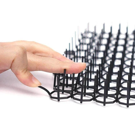 Garden Flower Anti Cat Net For Garden Use Size S 49x13 cm - lightweight black plastic mesh shown being cut and bent to protect flower beds