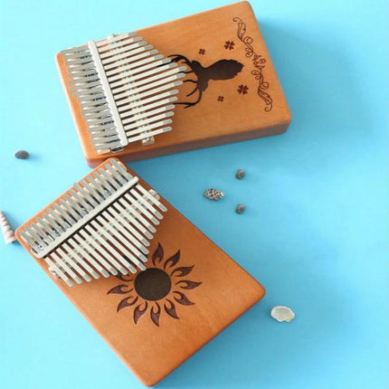 Compact Kalimba for Everyday Music Enjoyment at Home - portable mahogany thumb piano with sun and deer carvings, clear resonant tones for casual home practice
