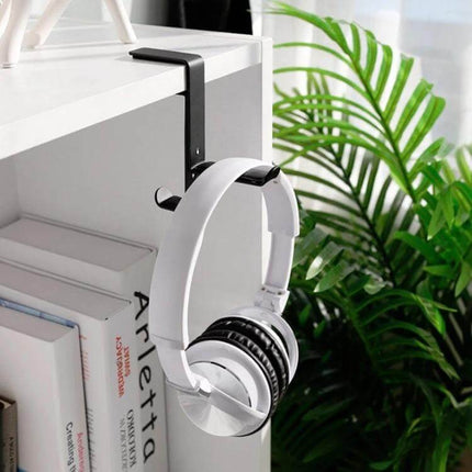 Under Desk Metal Headphone Hook For Desk Organization And Storage showing white over-ear headphones on a black metal clamp