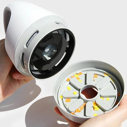 Compact USB Charging Vacuum for Desktop and Keyboard Cleaning showing open dust cup and motor assembly