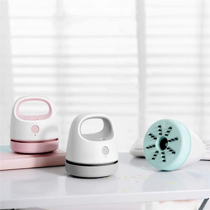 Compact USB Charging Vacuum for Desktop and Keyboard Cleaning — compact handheld USB vacuum in white and pastel colors for cleaning keyboards and desks