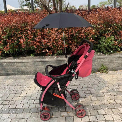 Universal Stroller Umbrella for Sun and Rain Protection attached to pink stroller providing sun and rain coverage