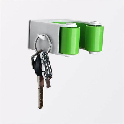 Bicycle Parking Buckle Wall Mount For Safe Bike Parking — PV polycarbonate wall mount with green rollers holding keys and bike wheel