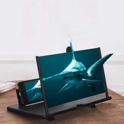 Foldable 12-Inch Screen Magnifier Holder for Smartphones showing phone magnified video with shark on 12-inch lens, portable stand