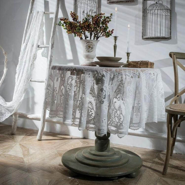 Round Lace Tablecloth Eyelash Lace For Outdoor Dining 150 cm on bistro table with vase and candles, delicate eyelash edging and soft polyester texture