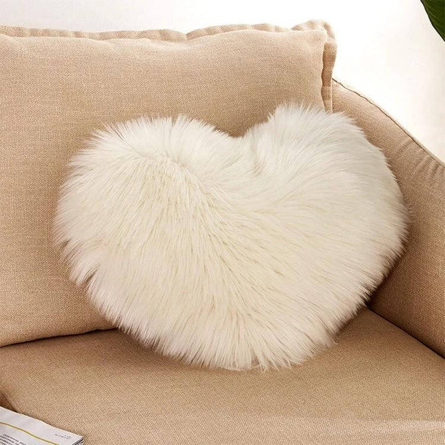 Home Cushion Pillow 40x50 Cm For Sofa And Bed Use plush heart-shaped white faux fur cushion on beige sofa