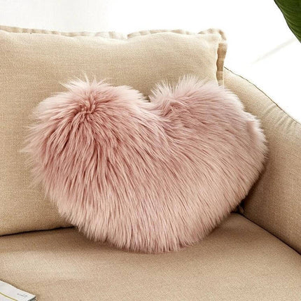 Home Cushion Pillow 40x50 Cm For Sofa And Bed Use plush pink heart-shaped faux fur throw pillow on beige sofa