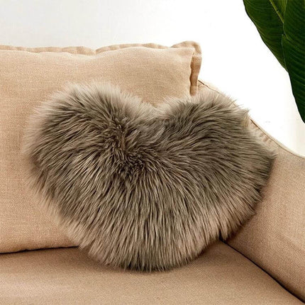 Home Cushion Pillow 40x50 Cm For Sofa And Bed Use plush heart-shaped faux fur cushion on beige sofa, soft PP cotton filling for comfy lounging