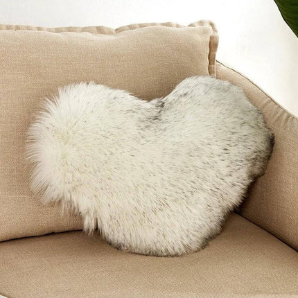 Home Cushion Pillow 40x50 Cm For Sofa And Bed Use plush heart-shaped white faux fur cushion on beige sofa