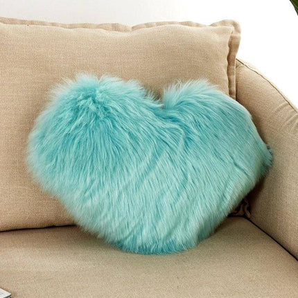 Home Cushion Pillow 40x50 Cm For Sofa And Bed Use - Plush teal heart-shaped cushion on beige sofa