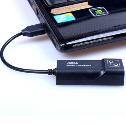 USB Ethernet Adapter for Laptop Wired Network Connections plugged into laptop USB port showing USB2.0 cable and Ethernet adapter for stable wired LAN