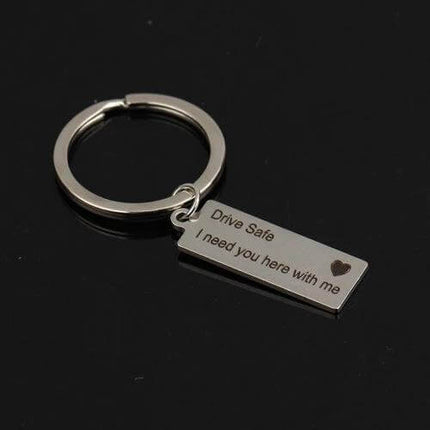 Keychain Engraved Drive Safe For Couples Everyday Gift - silver stainless steel rectangular pendant with "Drive Safe" engraving