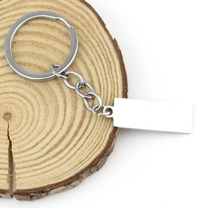 Keychain Engraved Drive Safe For Couples Everyday Gift - silver rectangular stainless steel keychain on wood slice