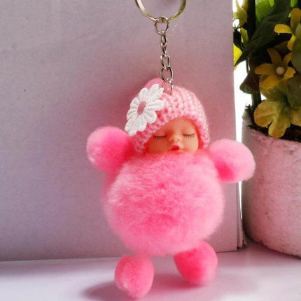 Sleeping Baby Doll Ball Key Chain Faux Fur Accessory For Daily Use pink faux fur sleeping baby doll keychain with knitted hat
