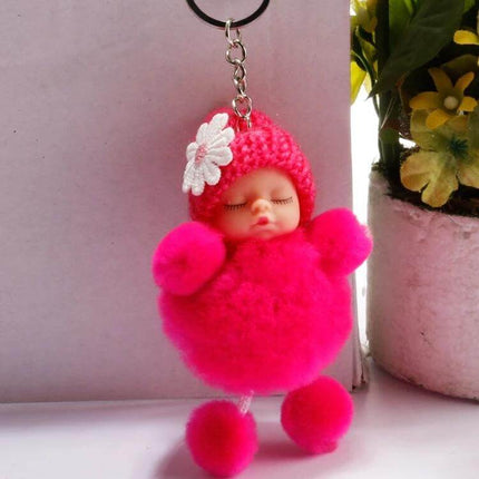 Sleeping Baby Doll Ball Key Chain Faux Fur Accessory For Daily Use pink faux fur sleeping baby doll keychain with pom-pom charm