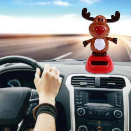 Solar Powered Home Decoration for Kids, Desk or Window Ornament — red solar-powered reindeer desk or car ornament on dashboard