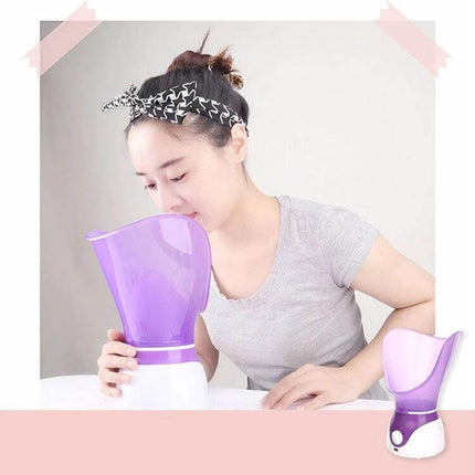 KH Facial Steam Machine For Deep Cleansing At Home Skincare Routine - woman using compact purple facial steamer for pore opening and hydration