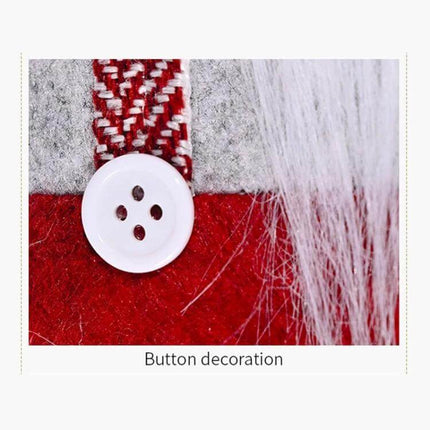 Christmas Curtain Buckle With Striped Hat, 38x26 Cm close-up of red felt, white button and striped hat trim for window decor