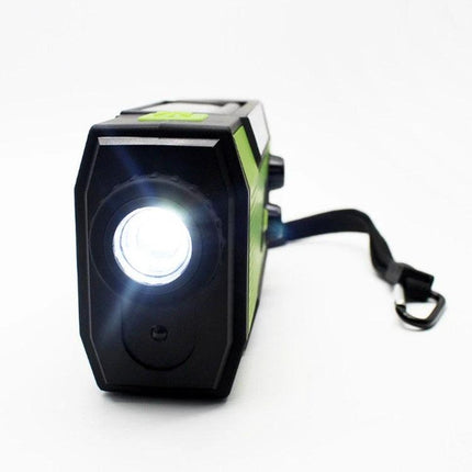 Hand Crank Solar Powered Emergency Radio with Flashlight and Weather Alert showing flashlight beam, crank handle and wrist strap for power outages and NOAA alerts