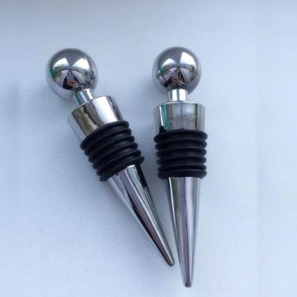 Reusable Red Wine Bottle Stopper For Everyday Home Use - chrome round-head plastic stopper with flexible black seal to preserve opened bottles
