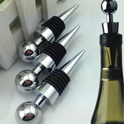 Reusable Red Wine Bottle Stopper For Everyday Home Use - three chrome plastic stoppers with round heads sealing an open wine bottle