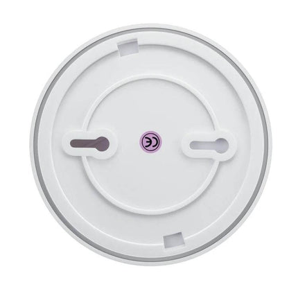 Wireless Smoke Detector for Home Fire Safety and Security - white round wireless smoke detector base with easy mount slots and photoelectric sensor