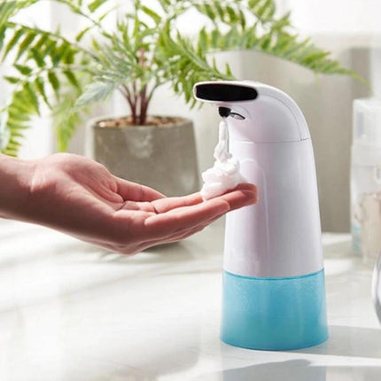 Household Automatic Foam Soap Dispenser for Daily Hand Washing dispensing touchless foam into a hand on a bathroom counter