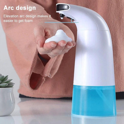 Household Automatic Foam Soap Dispenser for Daily Hand Washing dispensing touchless foam into a hand on kitchen counter, arc design