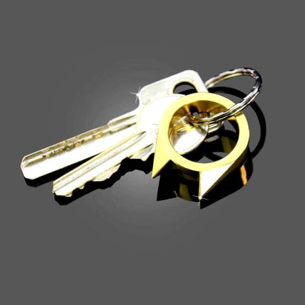 Stainless Steel Self-Defense Ring for Everyday Personal Safety shown on keyring with keys, compact corrosion-resistant stainless steel accessory