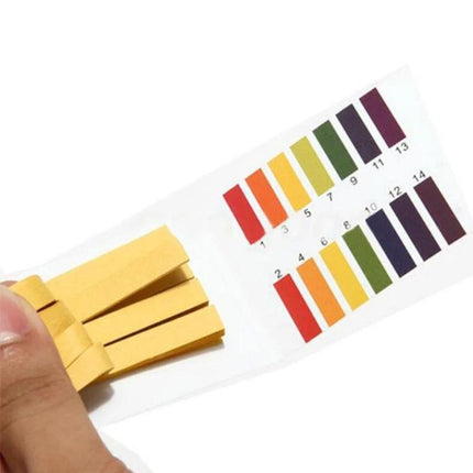 pH Test Strips for Water and Liquid pH Testing, 80 Strips Pack showing color chart and yellow test strips held for aquarium garden and cosmetic pH checks