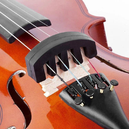 Silicone Accessory for Quiet Violin Practice at Home placed on violin bridge to reduce volume while preserving pitch for apartment or late-night practice