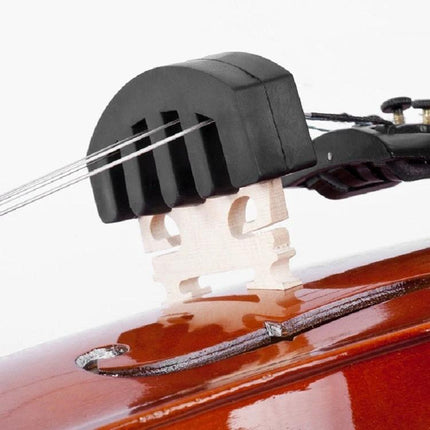 Silicone Accessory for Quiet Violin Practice at Home placed on bridge to reduce volume while preserving pitch