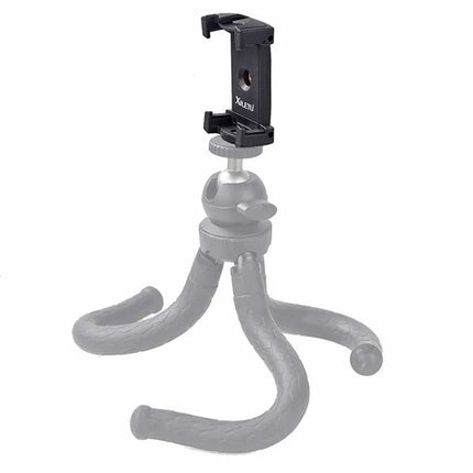 Xiletu Adjustable Phone Clamp for Hands-Free Video Recording on Tripods mounted on compact tripod for stable smartphone filming