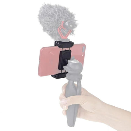 Xiletu Adjustable Phone Clamp for Hands-Free Video Recording on Tripods mounted on tripod grip with smartphone and microphone
