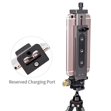 Xiletu Xj15 Desktop Tripod Mount for Tablets and Phones holding a smartphone vertically with reserved charging port and aluminum body