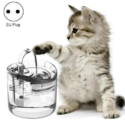 Essential Water Dispenser for Pets' Daily Home Hydration - gray kitten pawing at clear circulating water dispenser (EU plug)