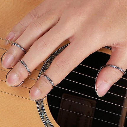 Durable Metal Spring Ring For Everyday Guitar Practice Sessions on fingers supporting strumming and picking