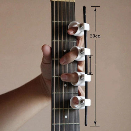 Handy Finger Expander for Everyday Music Practice Sessions - white ABS finger stretcher on guitar neck warming up fingers