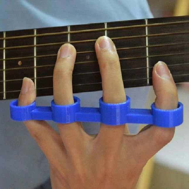 Finger Sleeves for Everyday Music Practice with Guitar and Piano - blue practice finger trainer on hand fretting guitar to reduce strain