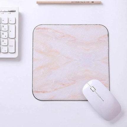 Marbled Mouse Pad with Pattern for Desk Use, 20x20cm - pink marble PU leather mouse pad on desk with white mouse and keyboard