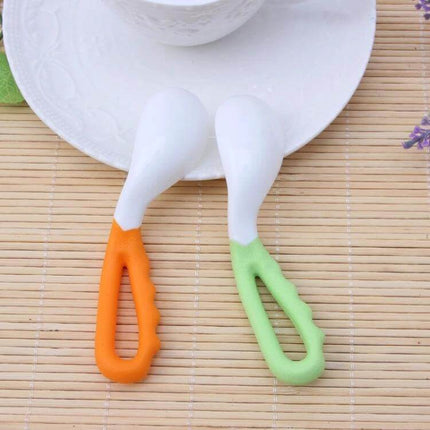 Baby Curved Feeding Spoon Set 2 Pack For Easy Feeding - two curved PP baby spoons with orange and green handles for neat early solids feeding